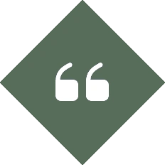 White quotation marks in a green diamond shape.